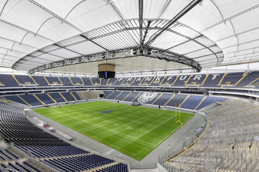 Interior view of Frankfurt Deutsche Bank Park under a retractable tensile membrane roof