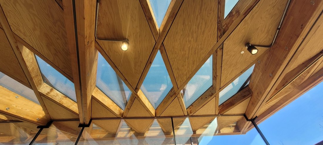 Structure bois et membrane textile toiture Horatio's Garden