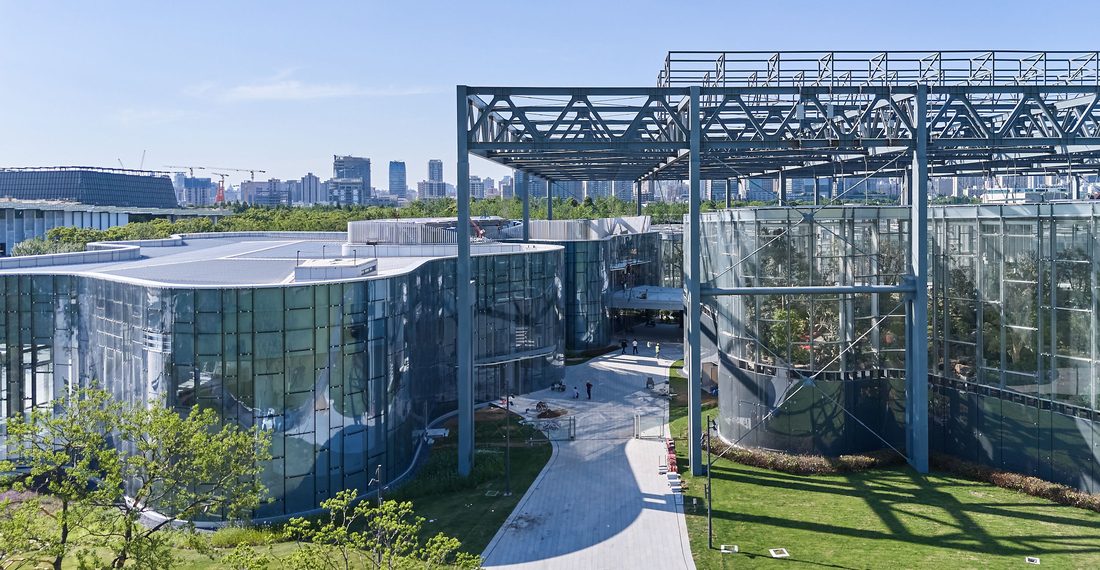 Exterior of the Greenhouse Garden with curved glass façades and Soltis 92 solar control at Shanghai Expo Culture Park.