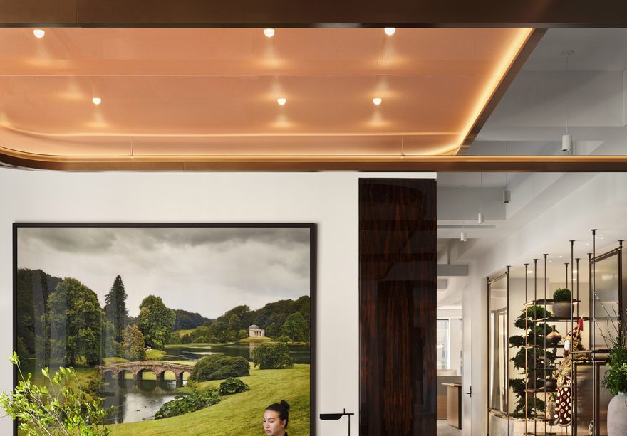Reception area of Corsair New York HQ under stretch ceiling installation by Serge Ferrari