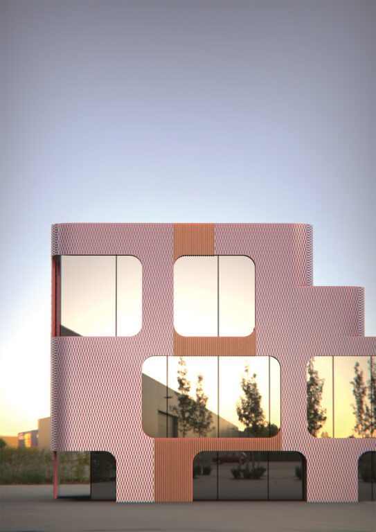 Vue d’un bâtiment contemporain à façade rouge ajourée, avec grandes ouvertures vitrées aux angles arrondis et reflets d’arbres dans les fenêtres.