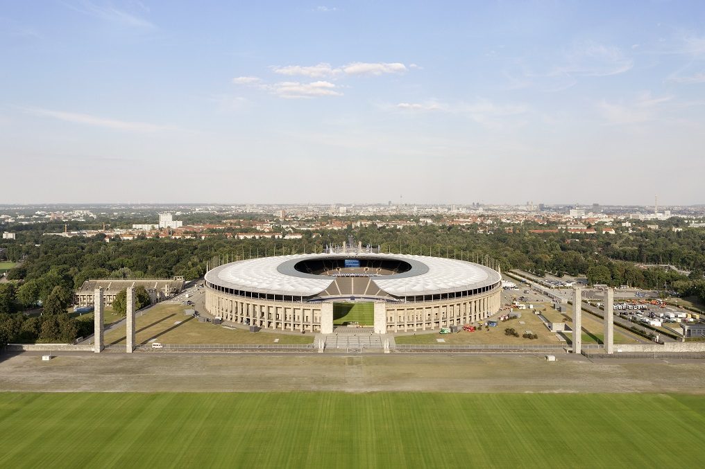 Panoramic view of Berlin Olympic Stadium with modern roof renovation