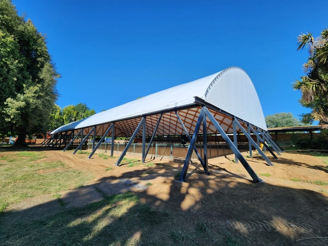 Exterior-to-interior view of Temuco covered ice rink with Serge Ferrari roof