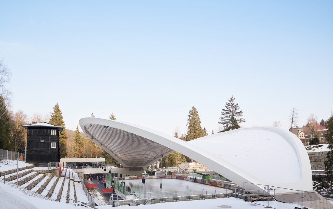 Schierker Feuerstein Arena ice rink covered by a flowing white tensile roof structure